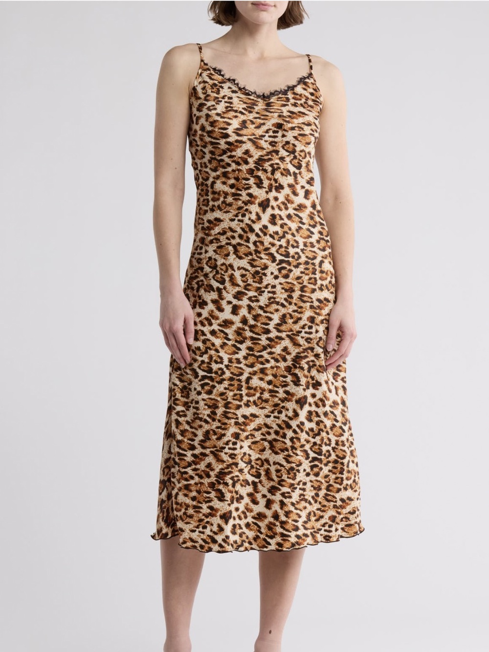 NWT bebe Delicate lace edges the neckline of an entrance-making slipdress Size L